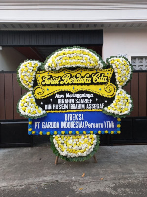 Papan Bunga Duka di Rua